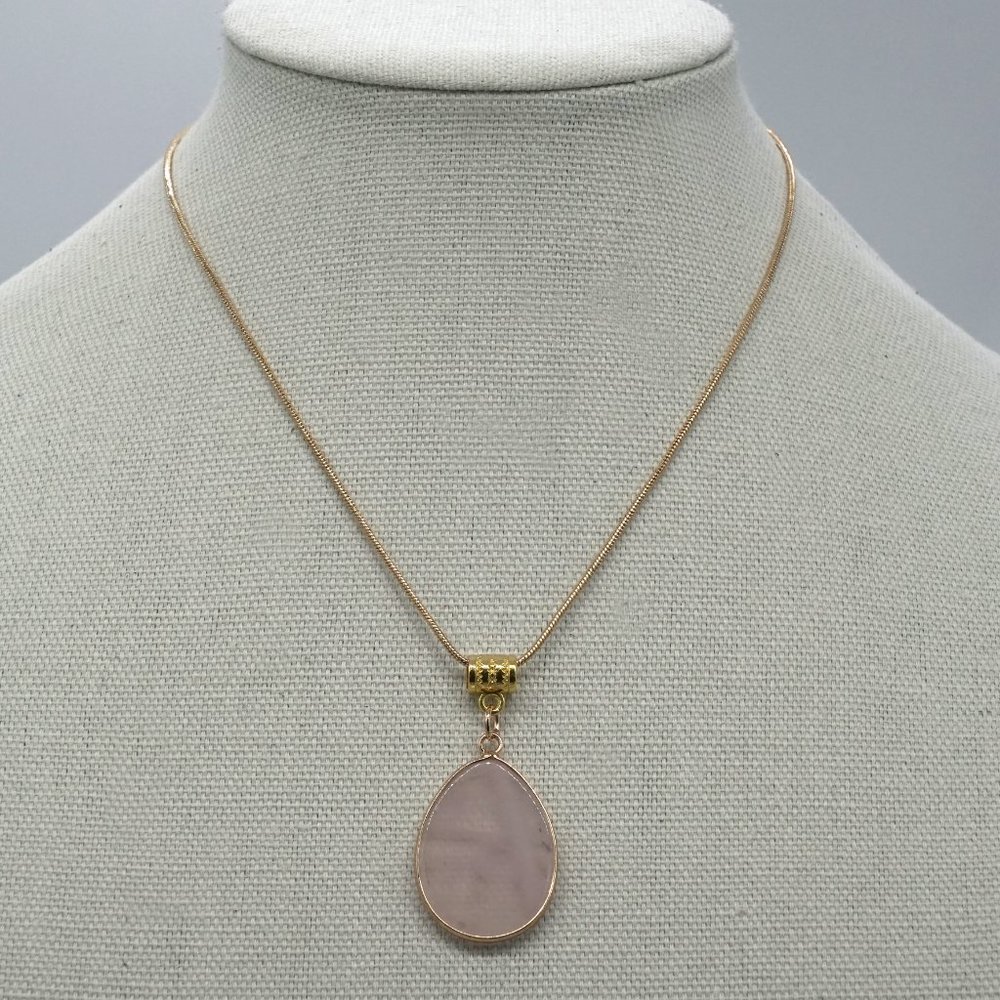 Genuine Rose Quartz stone with rope link chain.